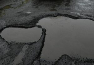 Pothole-riddled roads continue to plague commuters in Kochi city