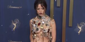 Actress Jenna Ortega wearing a gemmed halter at the Emmys